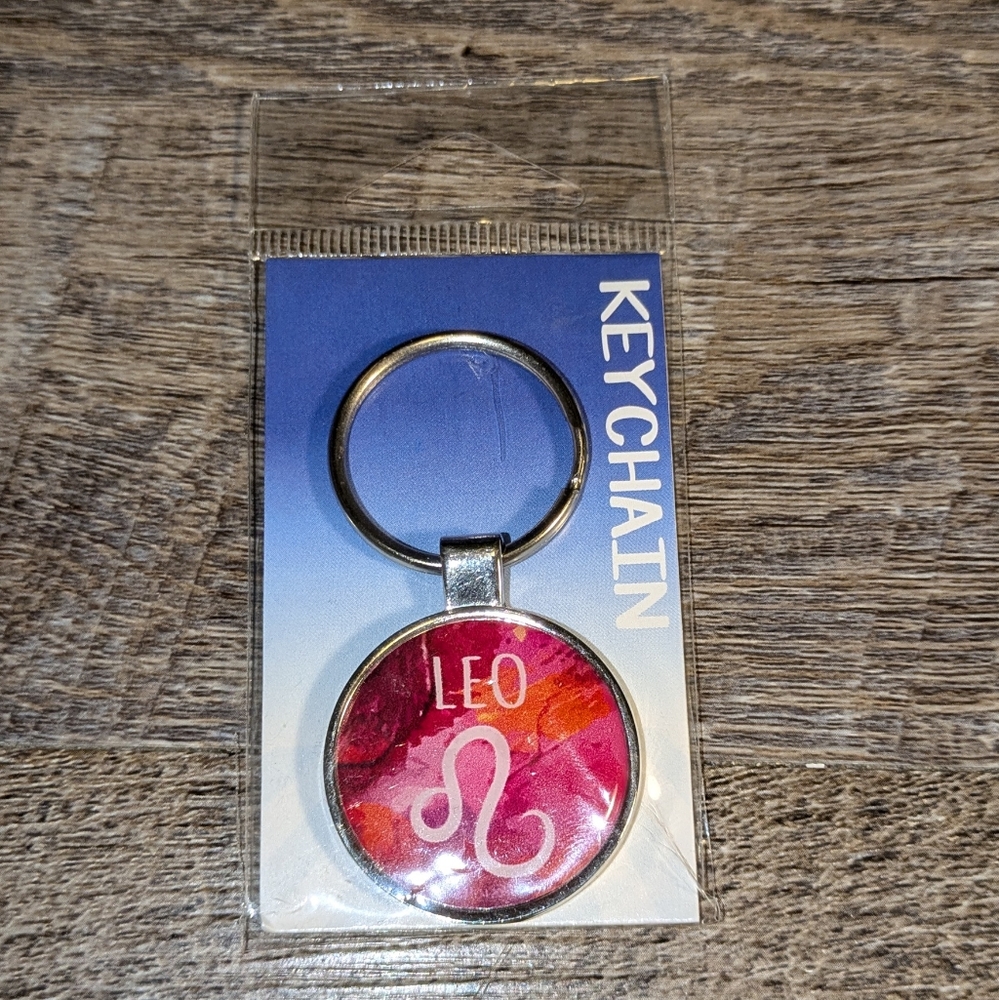 Unopened Leo star sign key chain